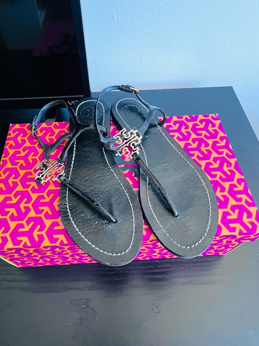Tory Burch Black T-Strap Logo Sandals with Gold Emblem
